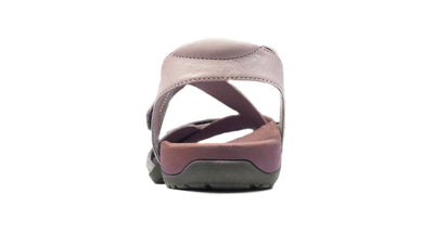 Rear view of Eliza Orthotic Sandals - Nude with arch support and a black sole on white background.
