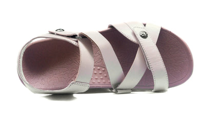 Single Eliza Orthotic Sandal in Nude with crisscross straps and textured footbed, top view.