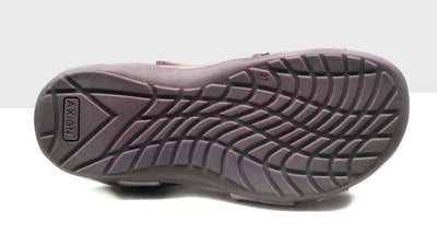 White Eliza Orthotic Sandal sole with arch support, textured tread, and "AXIGN" branding.