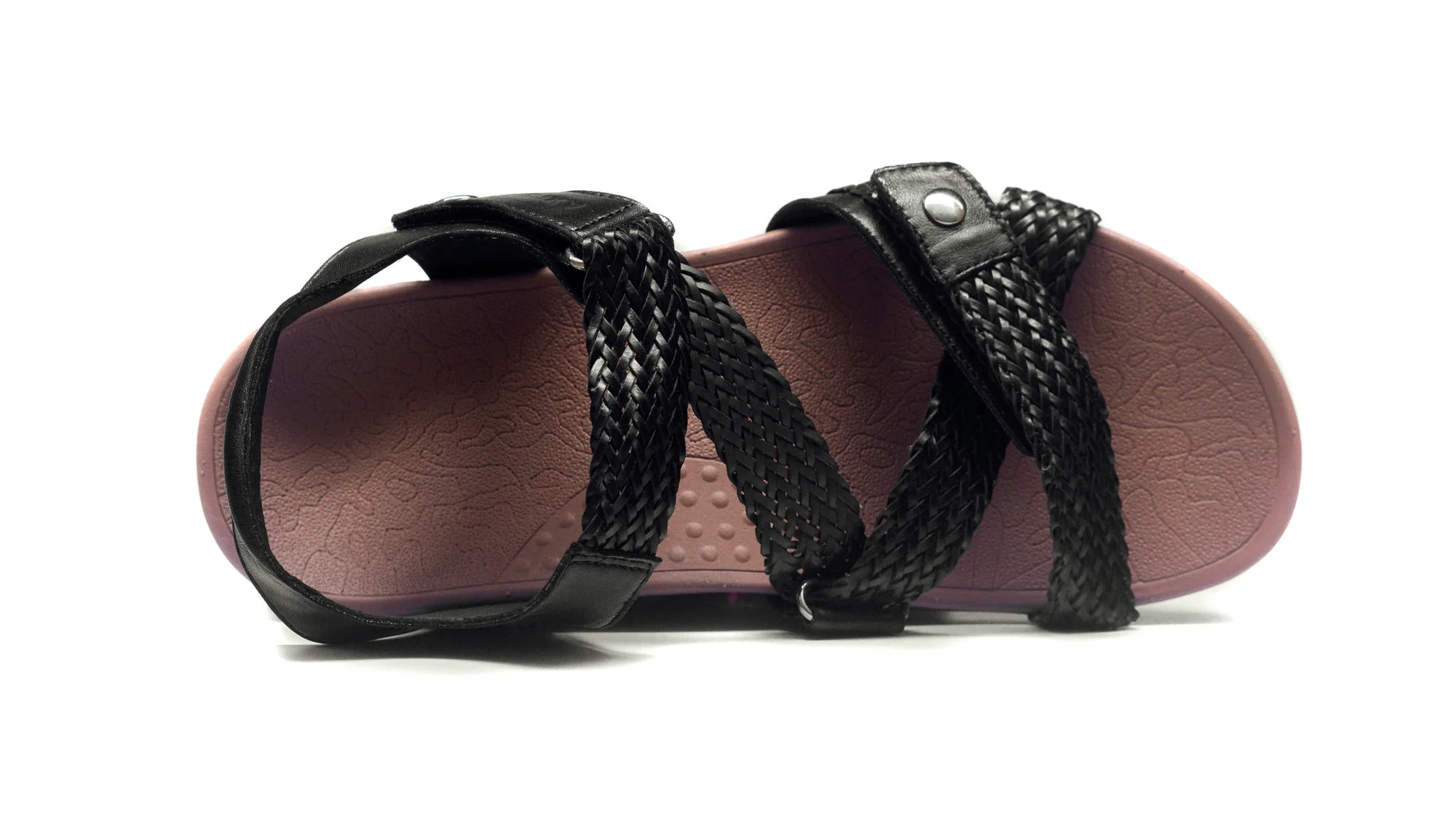 Black sandal with braided straps on a white background